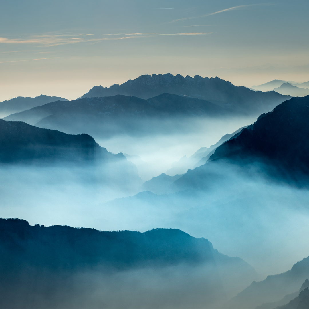 This is a mountain shrouded in fog to represent a forecast.