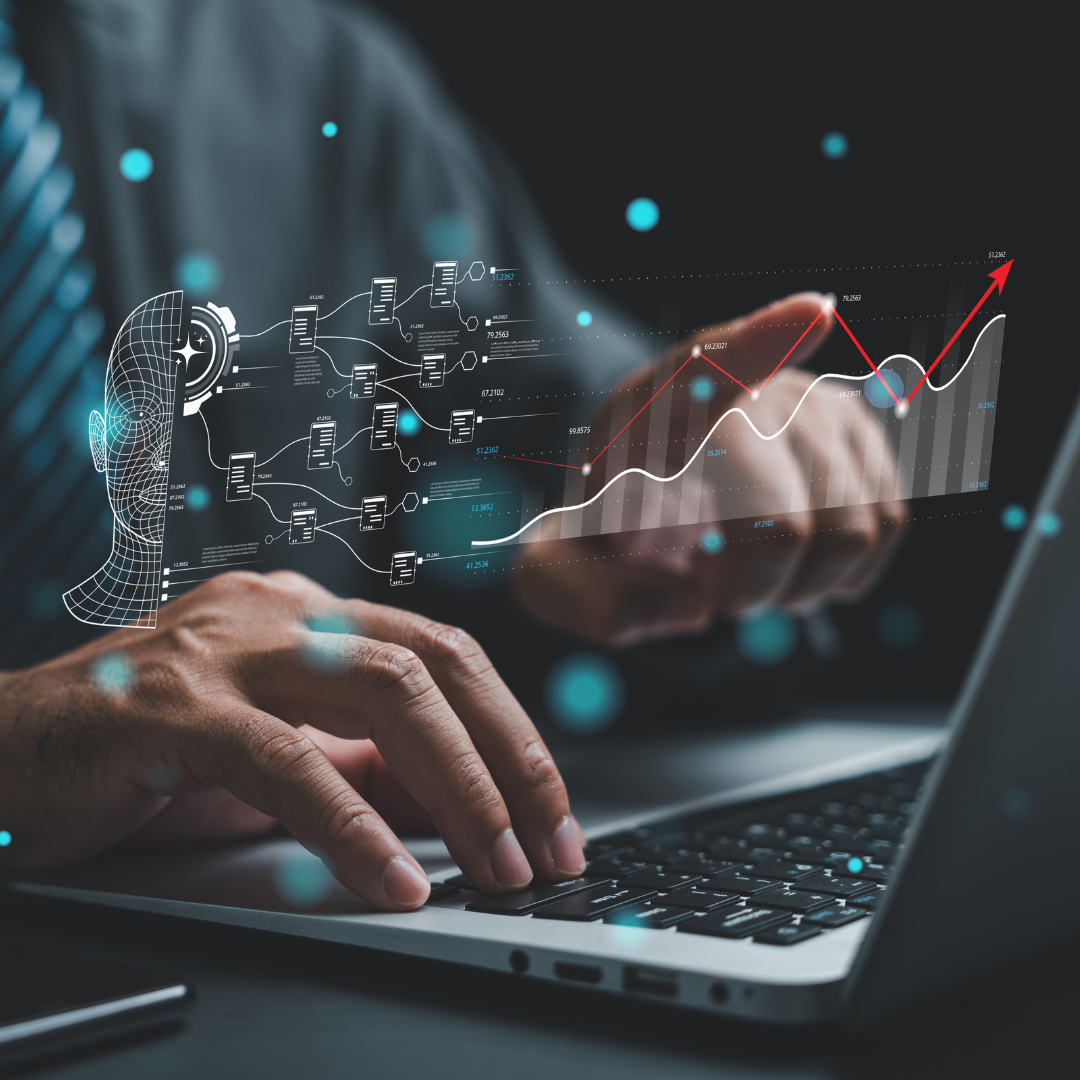 Hands typing on a laptop as holographic data charts and a rising line graph appear above the keyboard, conveying analytics in action.